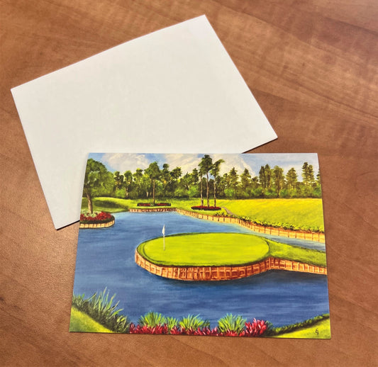 A NEVR LOOZ NOTE CARD featuring a painting of the 17th hole at TPC Sawgrass, with a golf course and pond depicted, by artist Cindy.