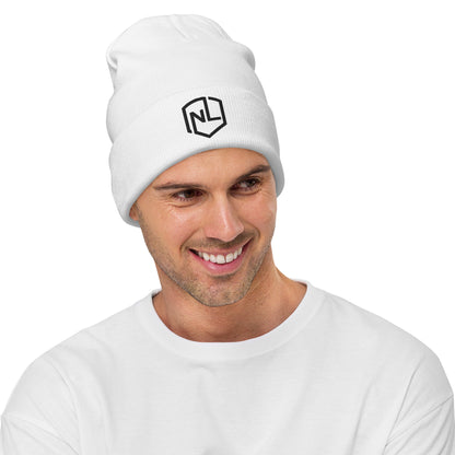 A man in a white beanie and hoodie, showcasing a form-fitting, embroidered NEVR LOOZ hat - Beanie. Made of 60% cotton, 40% acrylic for cozy warmth. On-demand production for sustainability.